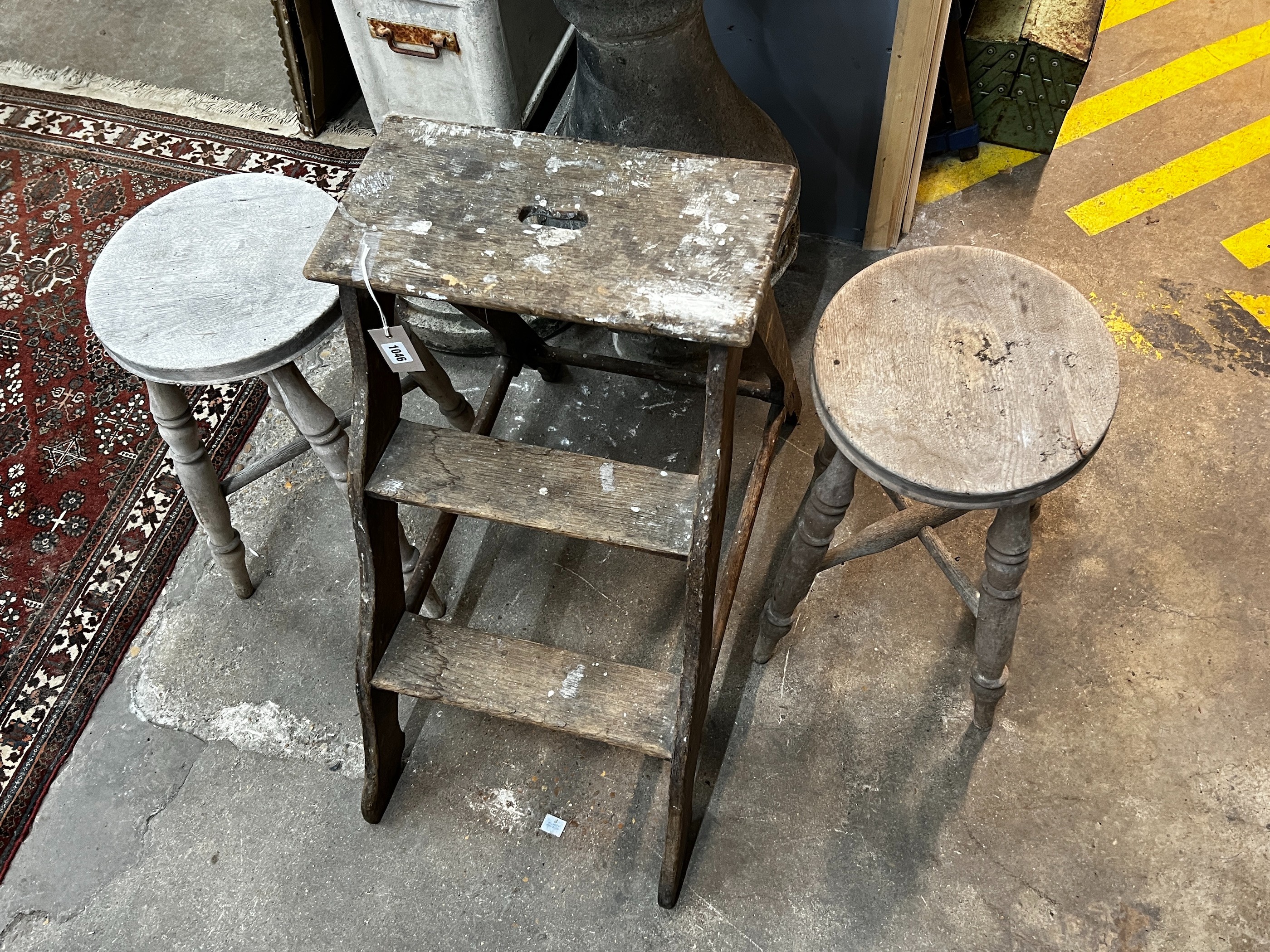 A set of provincial oak steps, height 67cm together with a pair of bleached stools